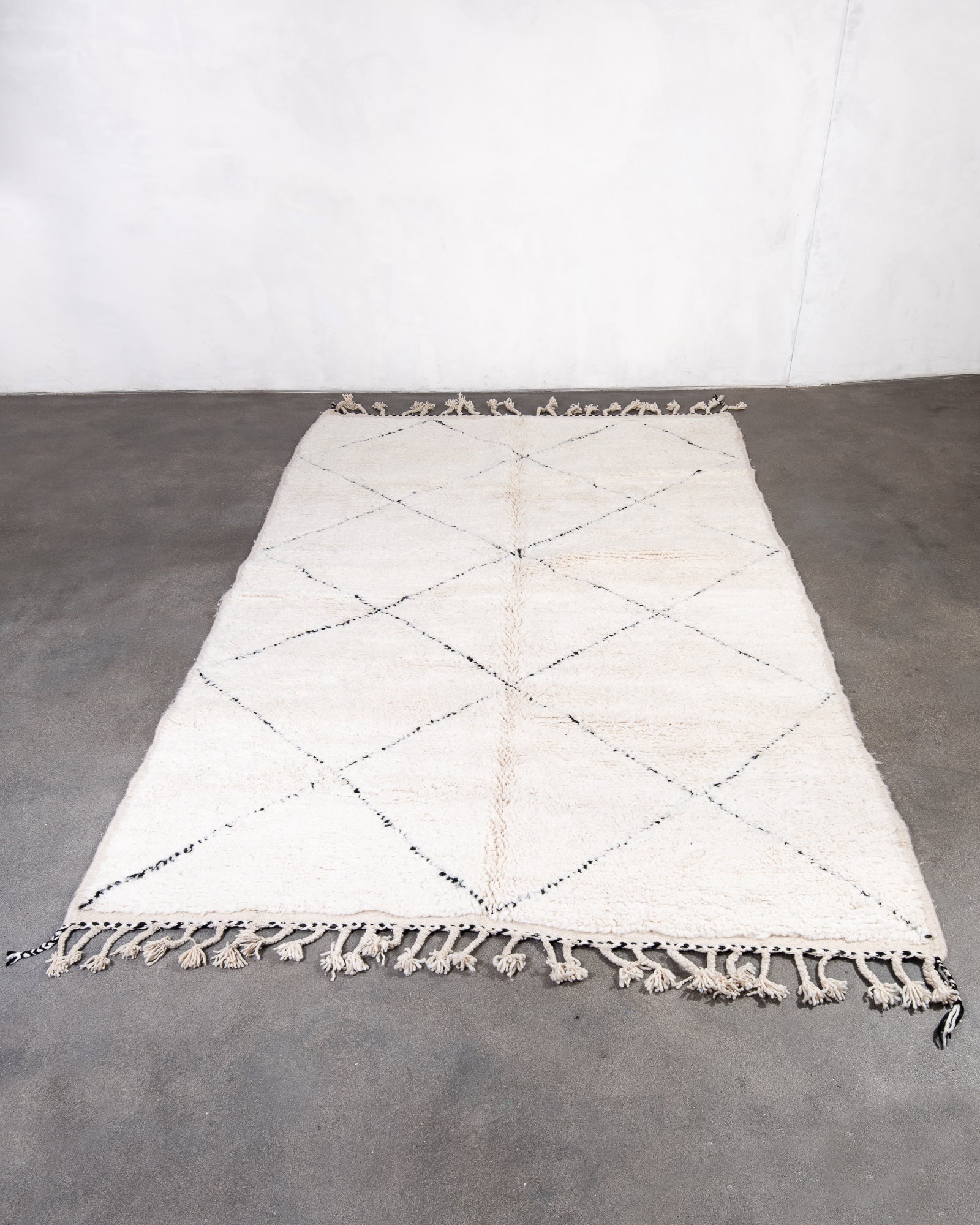 Modern, designer, handcrafted Berber rug from Morocco. Beniourain carpet with beautiful colours and patterns and fluffy wool texture.